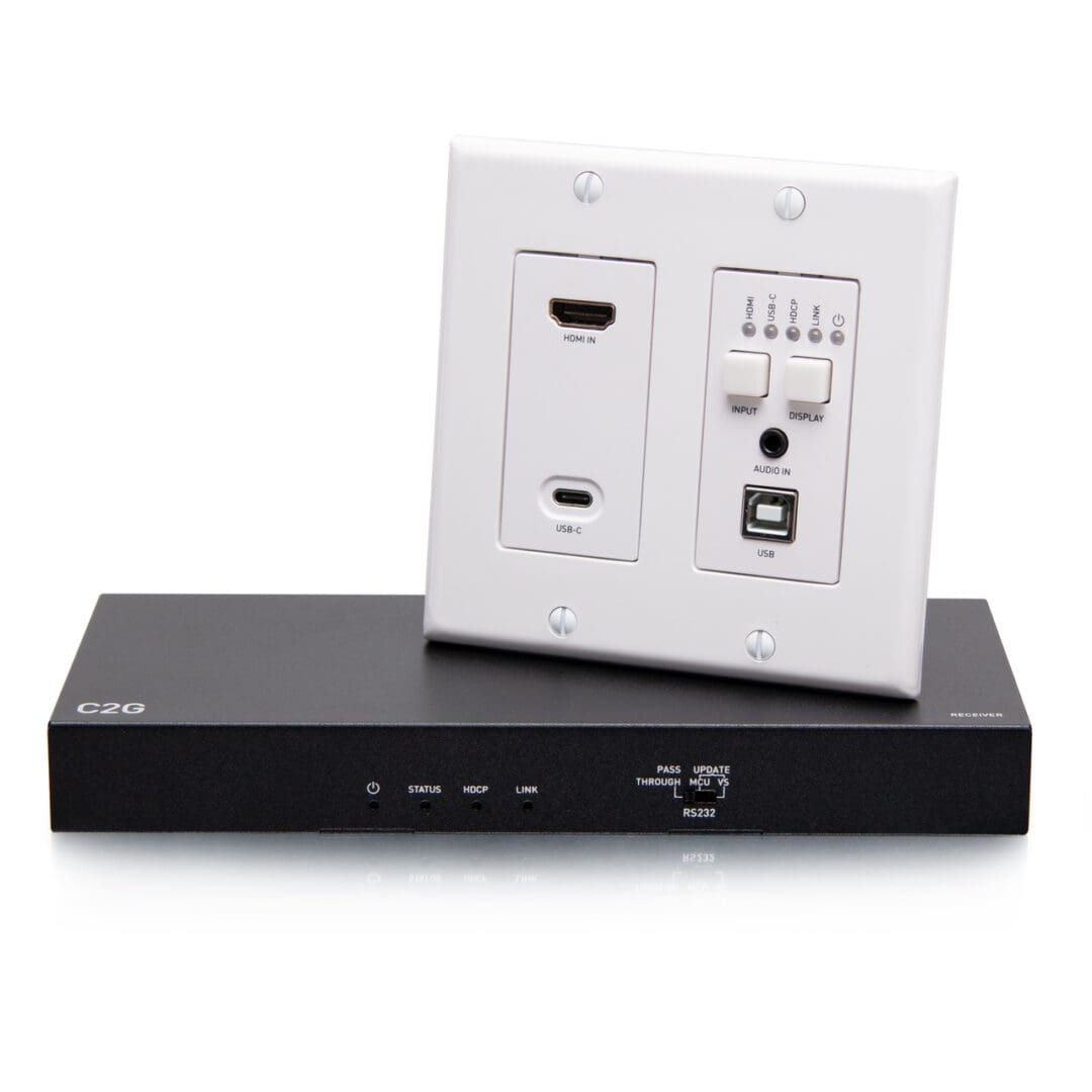 Here's an alt tag for the image: Wall plate with HDMI, USB, and audio receiver.