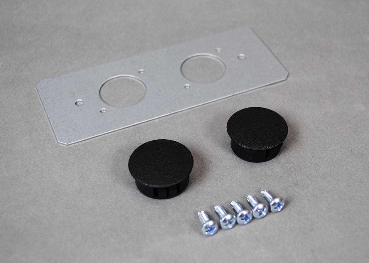 Here's an 8-word alt tag for the image: Double wall plate kit with screws and plugs.