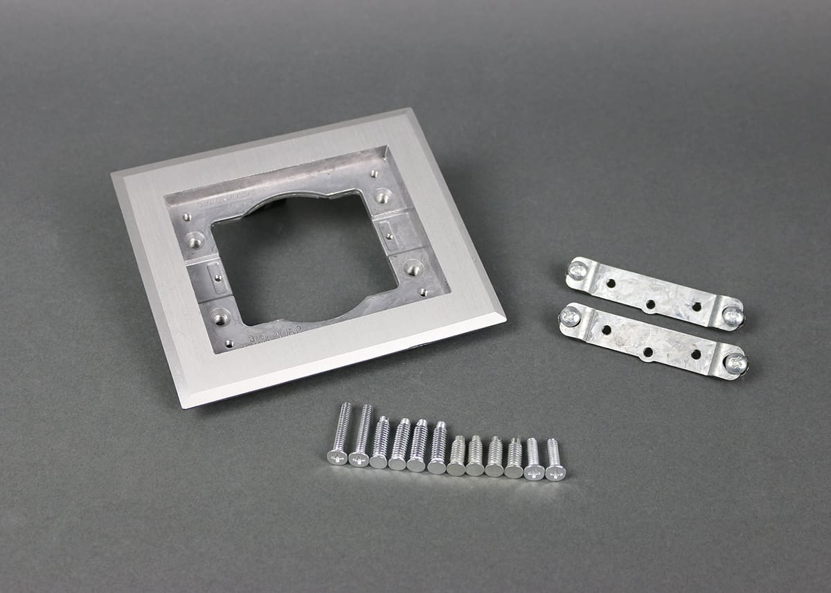 Aluminum wall plate kit with screws.