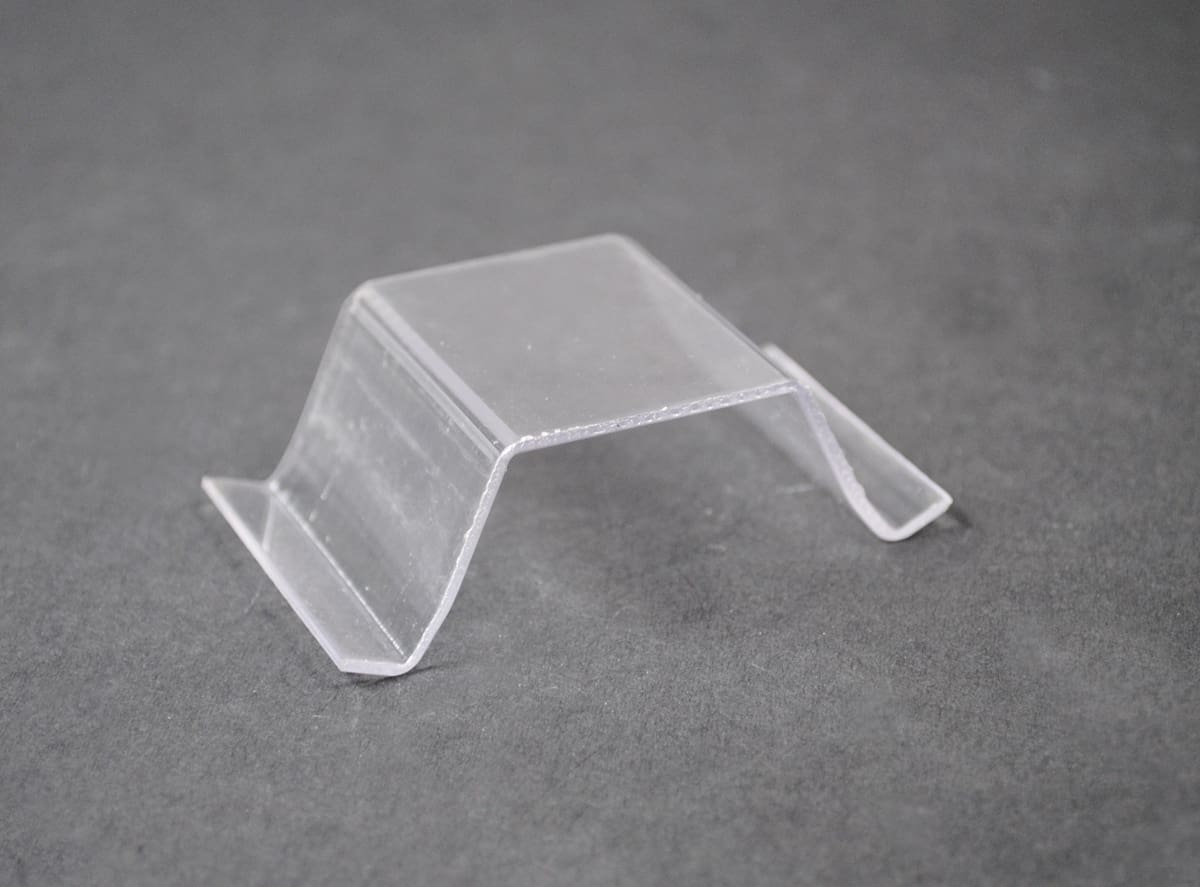 Clear plastic display stand.
