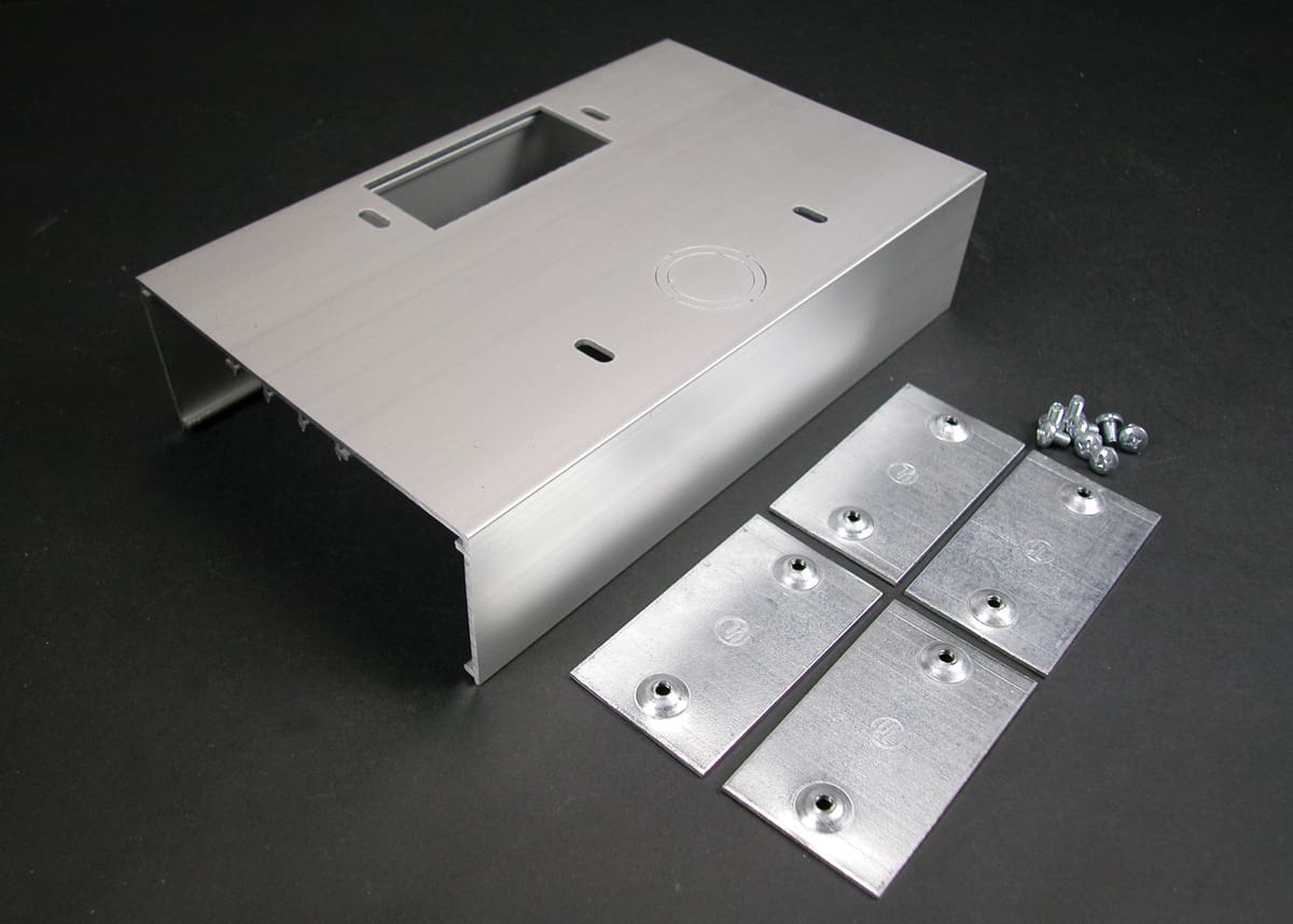 Aluminum enclosure kit with mounting plates.