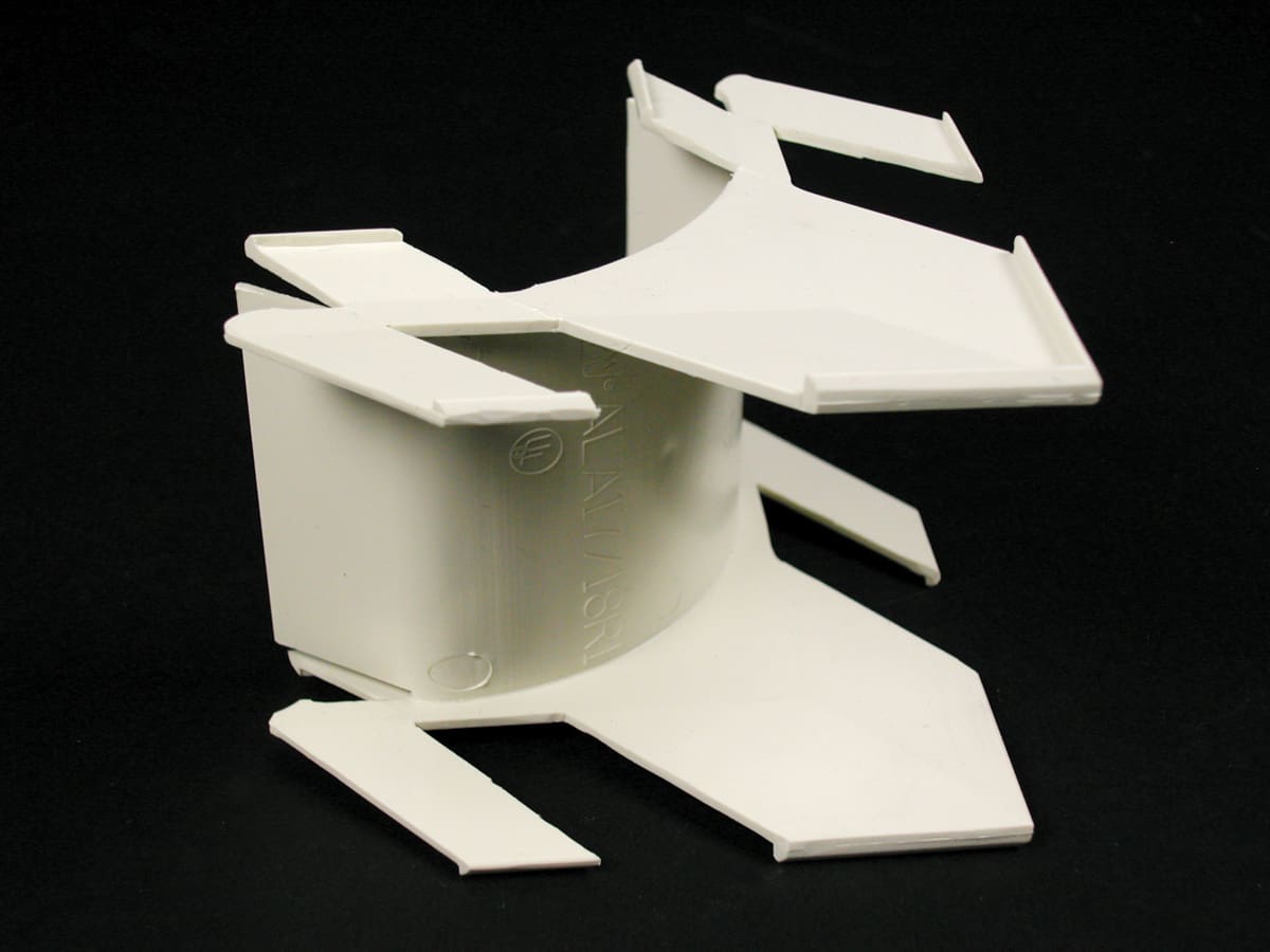 White plastic pipe support bracket.