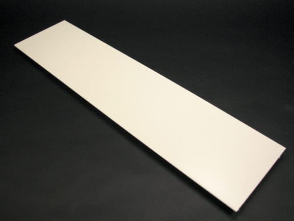 Off-white rectangular plastic panel.