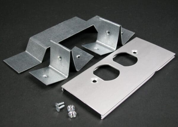 Metal electrical outlet plate with brackets.