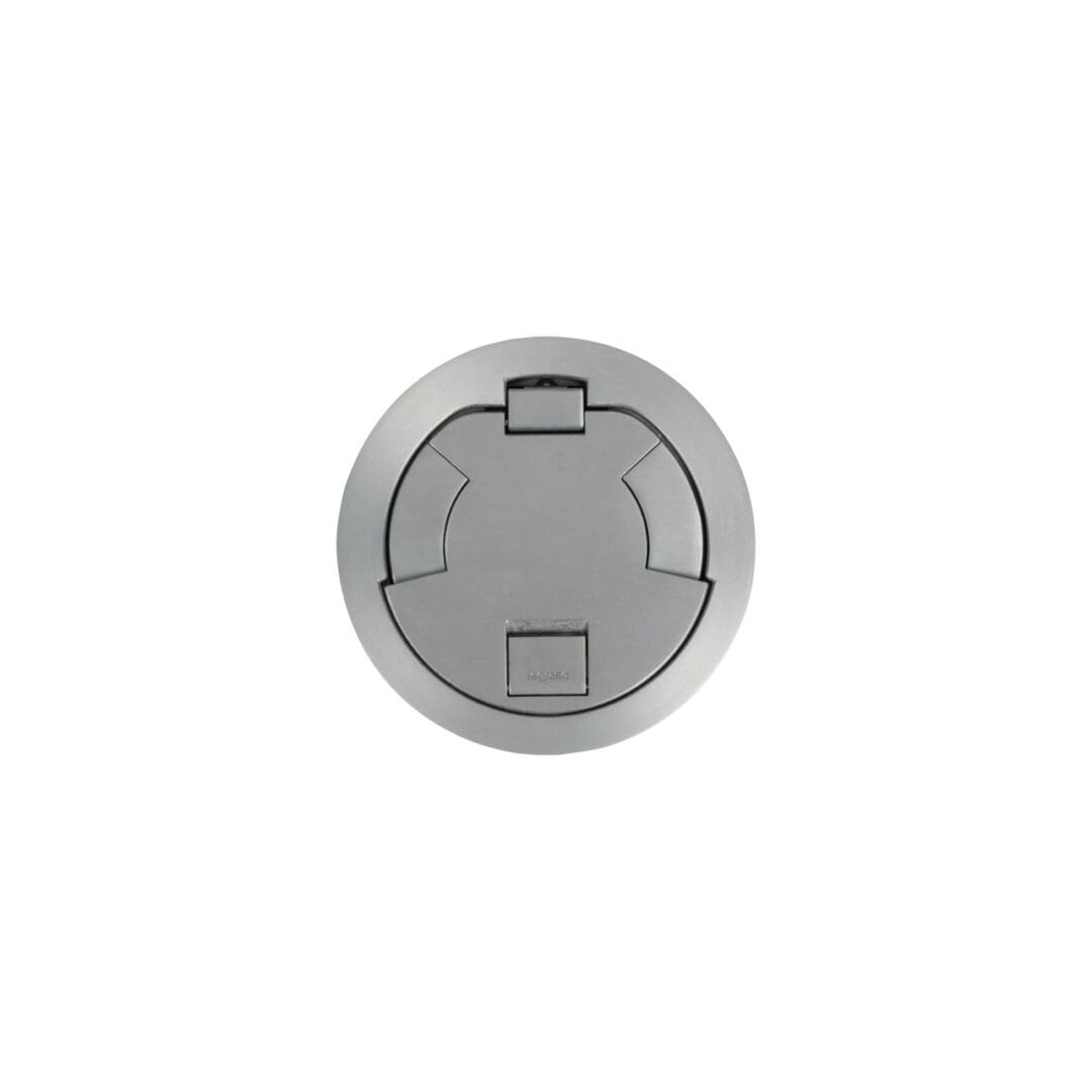 Here's an alt tag for the image: Silver circular floor outlet cover.