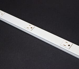 Here's an alt tag for the image: White power strip with multiple outlets.