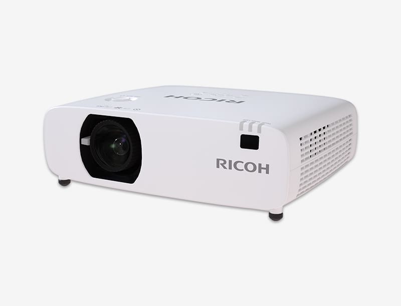 Ricoh projector, white, angled view.