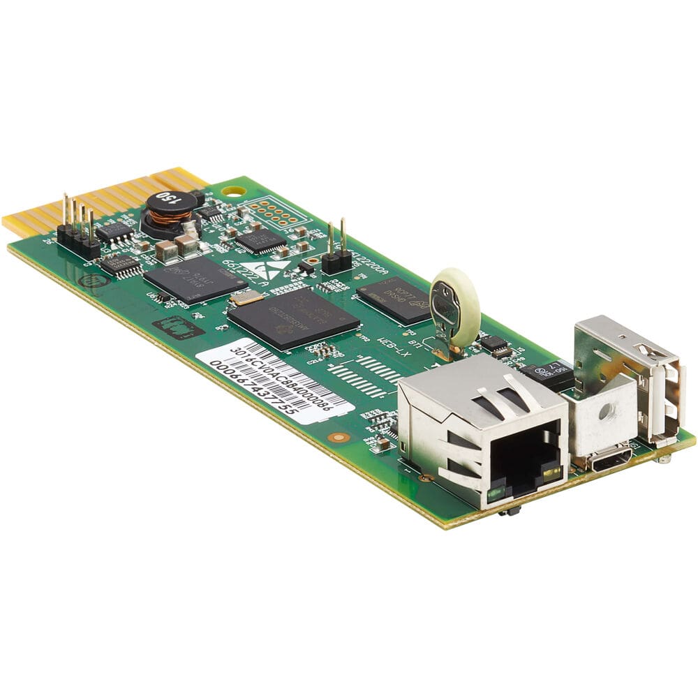 Green circuit board with Ethernet and USB.