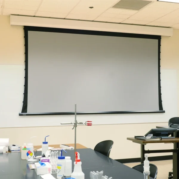 Large projector screen in classroom.