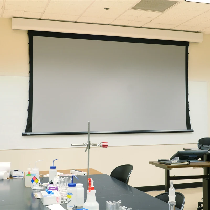 Large projector screen in classroom.