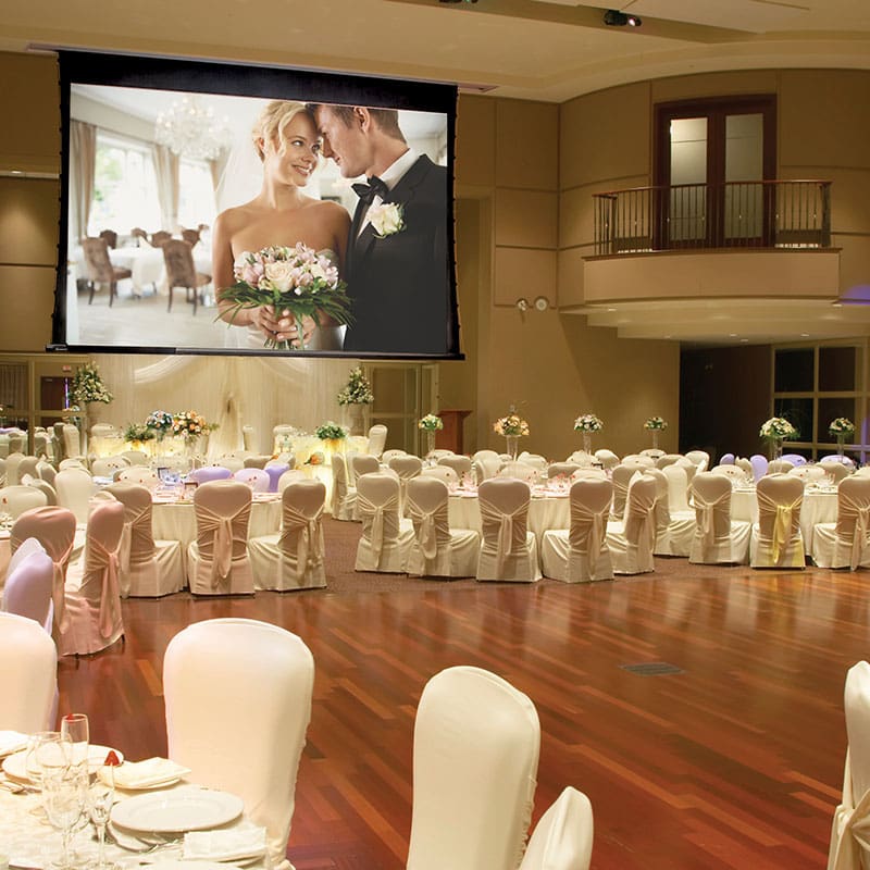 Wedding reception with projected photos.